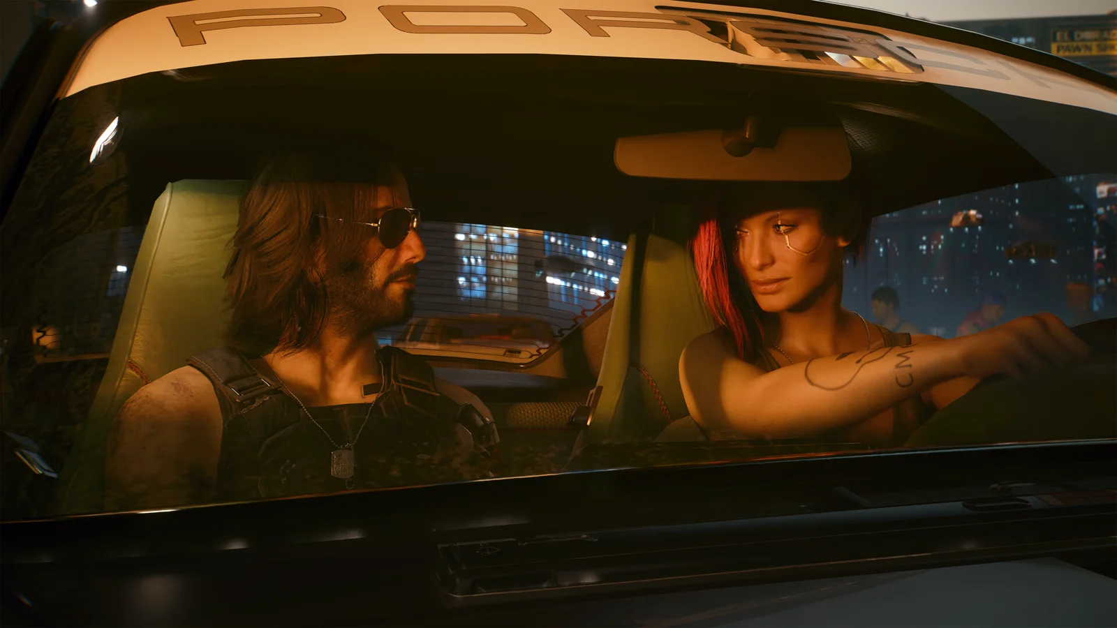 Personagens dentro de um carro em cena de Cyberpunk 2077